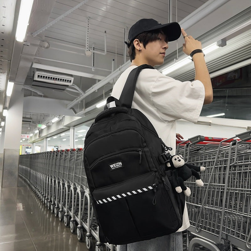 School bag male large capacity junior high school student middle school student fashion trend simple backpack female business travel bag