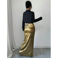 Women's two-piece set: long-sleeve button-down shirt and metallic high-waisted slit maxi skirt outfit, perfect for a night out