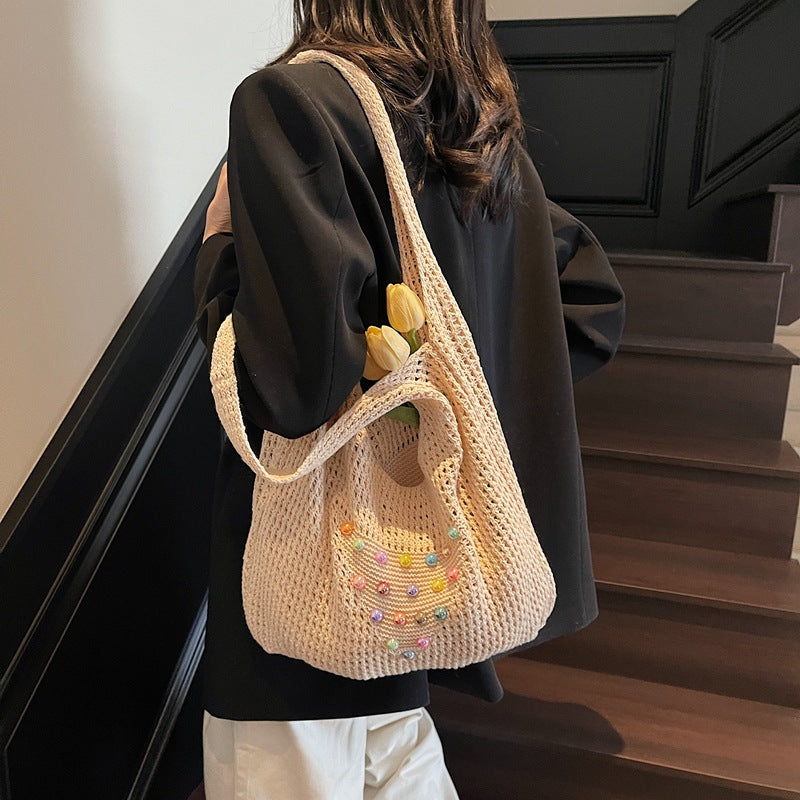 Seaside commuter shoulder tote bag vacation woven bag women's summer colored pearl hollow large capacity underarm bag women