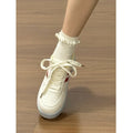 High-style hong kong-inspired versatile sneakers: 2026 new thick-soled white shoes, lightweight and breathable bread-style casual women's shoes for commuting