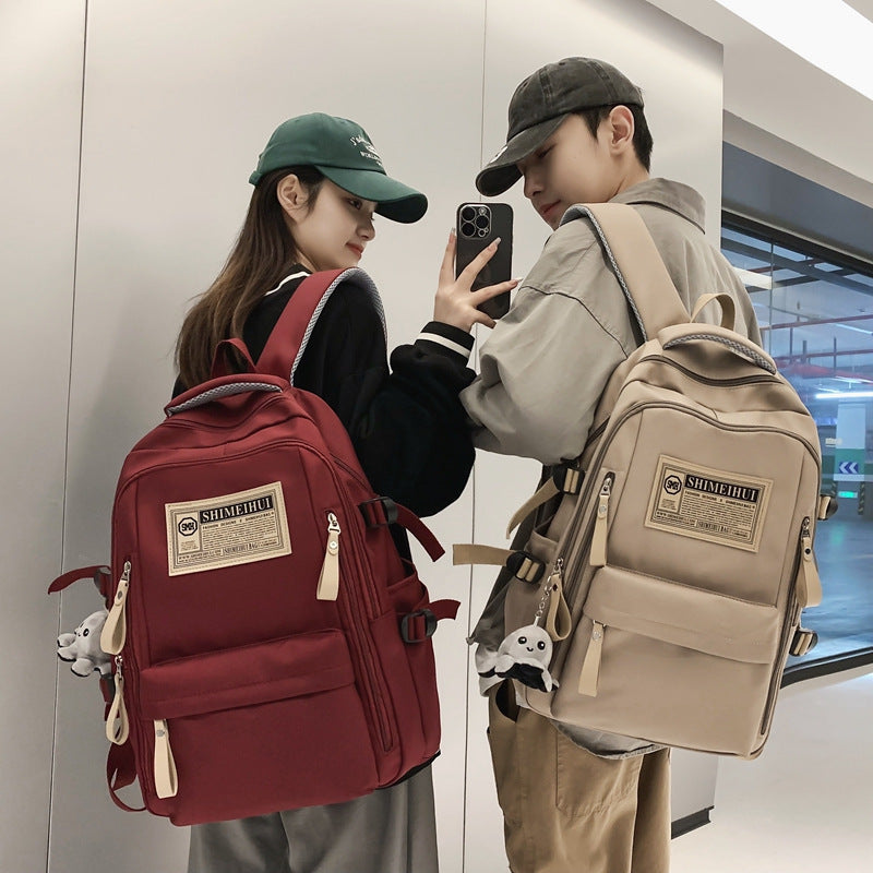 Spring and summer simple travel backpack computer backpack casual solid color ultra-light junior high school students large-capacity schoolbag