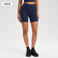 High-waisted, figure-hugging peach cutout shorts with color blocking and seamless design - perfect for running, fitness, and yoga (yg-1002)