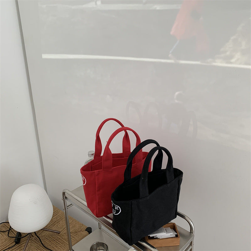 New bag female Korean generation with the same letter printed canvas handbag bento bag simple casual light tote bag