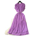 French-inspired v-neck floral chiffon dress with flared sleeves, tie waist, and a figure-flattering, vintage-inspired silhouette