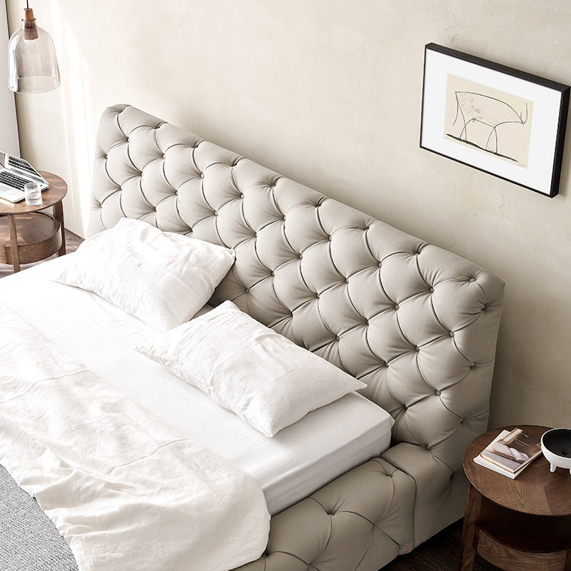 Foshan furniture italian light luxury master bedroom button bed modern casual internet celebrity bed genuine leather cream style double fabric bed