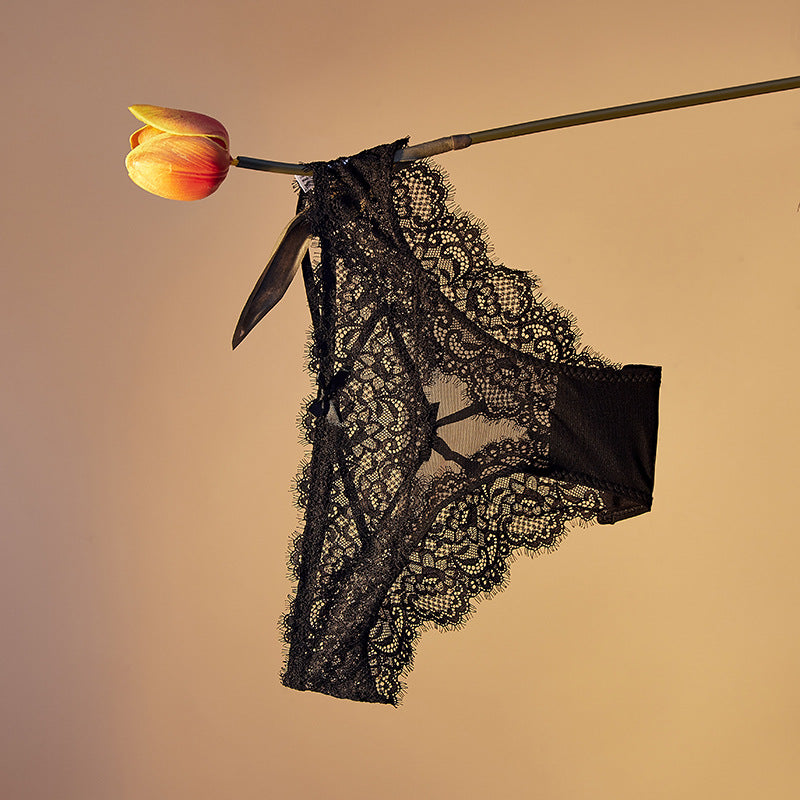 lingerie factory: low-rise, sexy women's panties featuring bow accents, lace detailing, and a breathable, criss-cross design. women's briefs