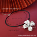 Classic leather chain clasp faux pearl pendant with floral, starfish, and seashell design – perfect for women's gatherings