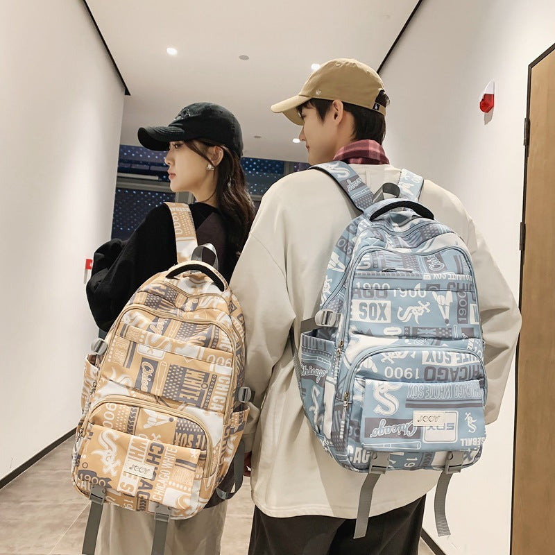 New large-capacity Korean version of middle school students, junior high school backpacks, men's fashion trend graffiti schoolbags, women's strong backpacks