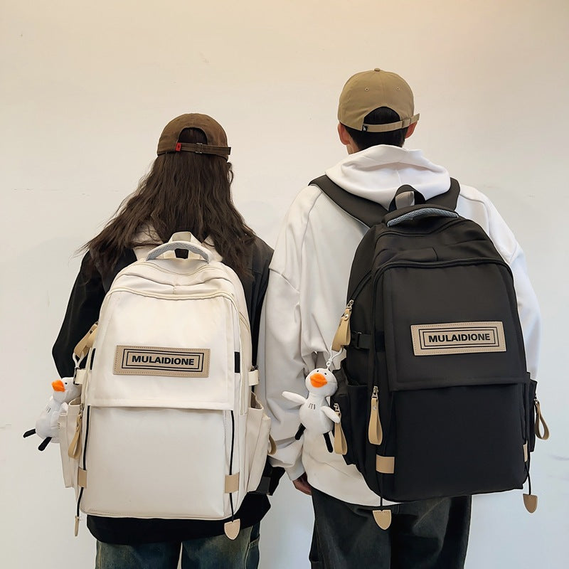 New large-capacity backpack, male and female college students with the same schoolbag, junior high school high school students travel business computer backpack