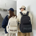 supply backpack - unisex, waterproof, multifunctional travel backpack with printed lettering, suitable for laptops