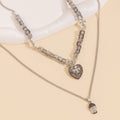 Hip-hop trendy versatile skull pendant necklace - statement layered metal heart cross men's necklace