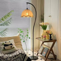 Retro internet celebrity lotus leaf floor lamp s-shaped medieval style living room tea room wabi-sabi vertical lamp bedroom study eye protection lamp