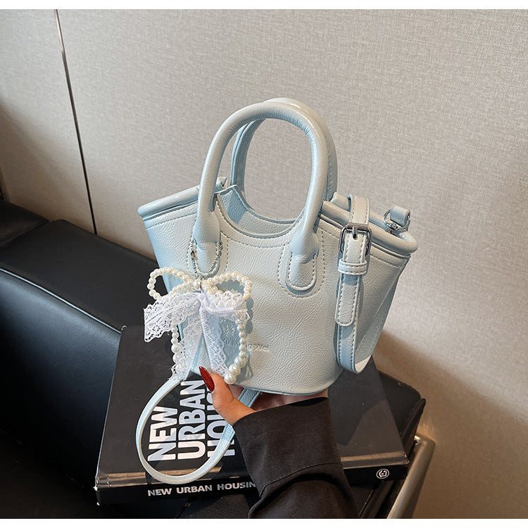 Cross-border texture contrasting handbag bag 2025 new fashionable versatile foreign gas bucket bag casual simple messenger bag