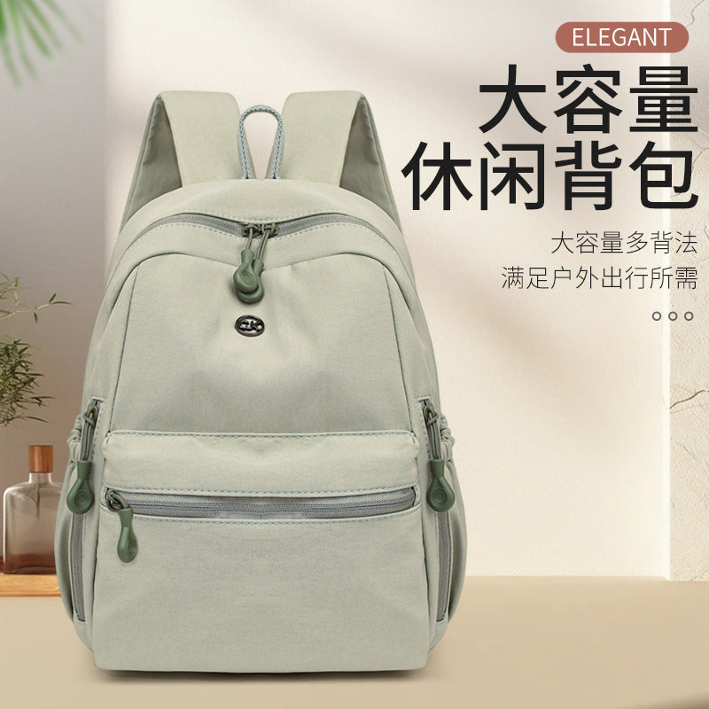 New double shoulder schoolbag Korean version casual simple versatile lightweight backpack solid color large capacity commuter bag double shoulder women's bag
