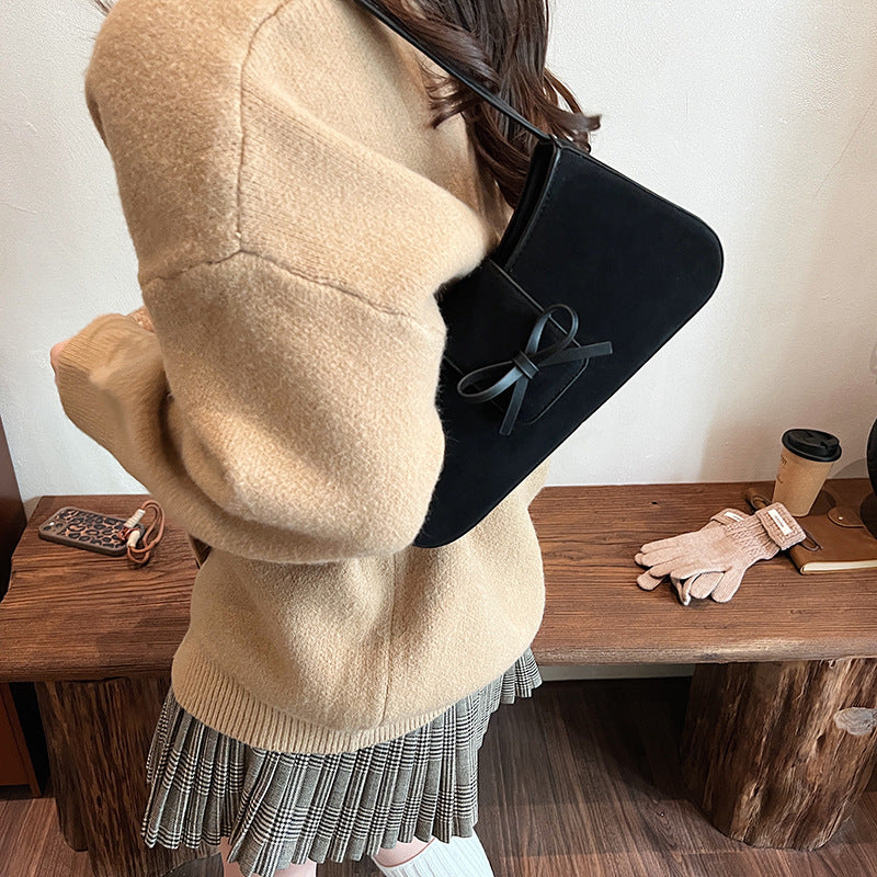 Red bag women's bag 2025 new shoulder baguette bag Korean version fashion minimalist niche bow armpit bag