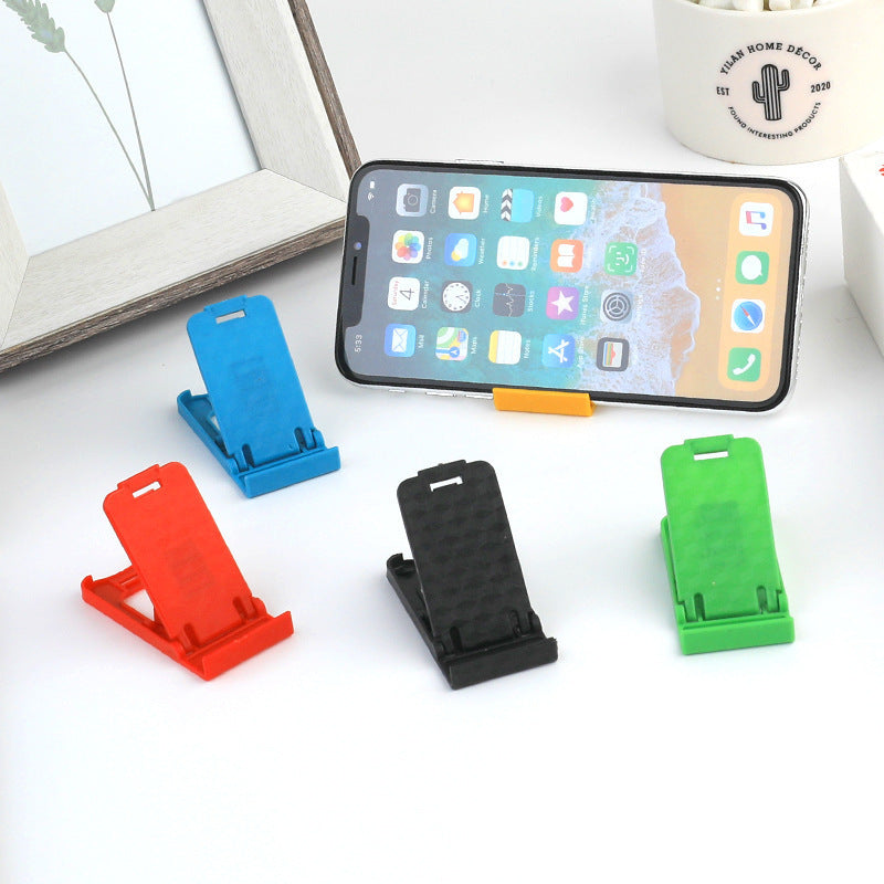 Plastic desktop folding mini mobile phone holder, multi-file desktop foldable lazy tablet holder wholesale