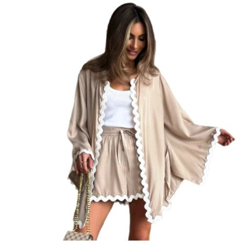 Cross-border European and American women's clothing contrasting colors corrugated long-sleeved cardigan shirt  new casual foreign shorts two-piece set women