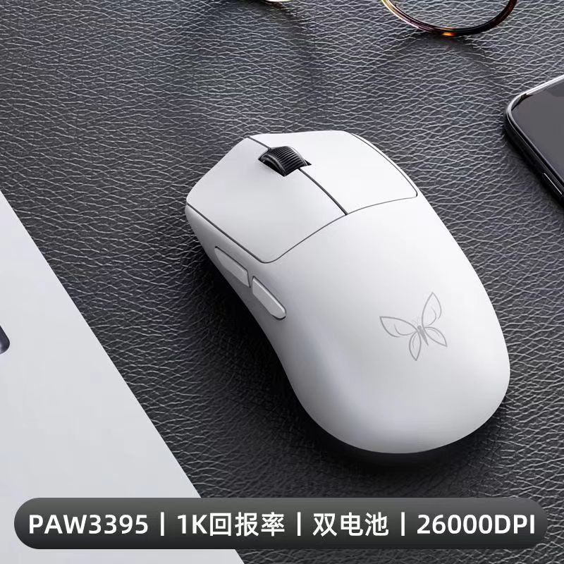 Xinmeng butterfly wireless gaming mouse 2.4g bluetooth wired three-mode esports paw3395 dual battery lightweight
