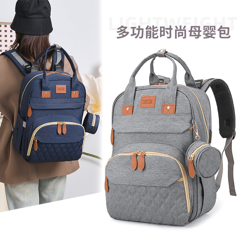 Cross-border customized large-capacity mommy bag, multi-functional mother and baby bag, thermal insulation bottle warehouse, casual outdoor backpack.