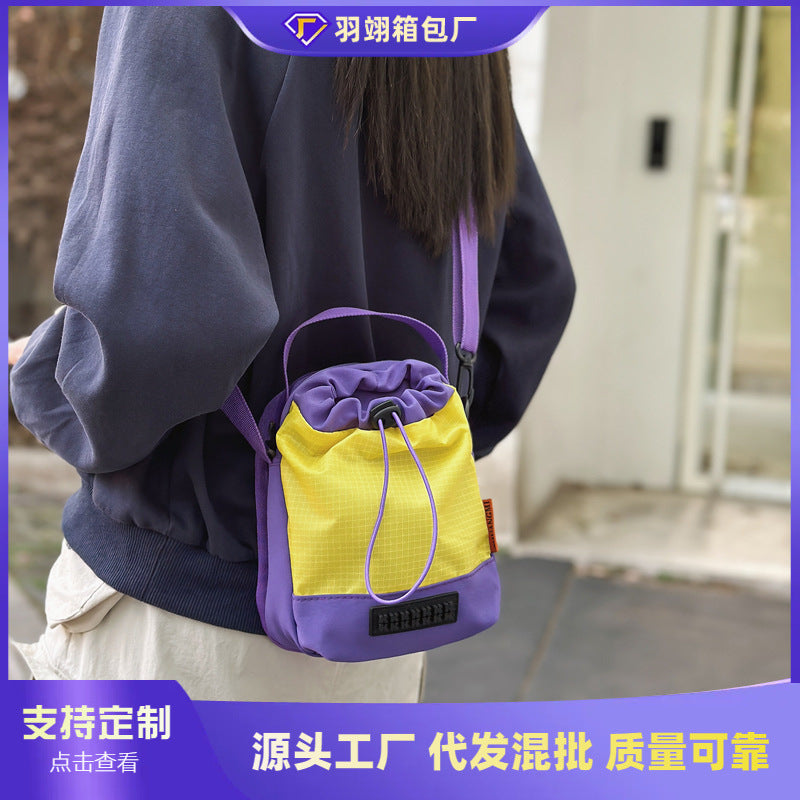 Foreign trade cute contrasting color draw belt small bag women 2025 new versatile sports and leisure shoulder messenger bag cloth bag