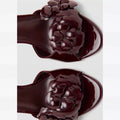 Mng mango women's chocolate brown patent leather heeled sandals with floral detail