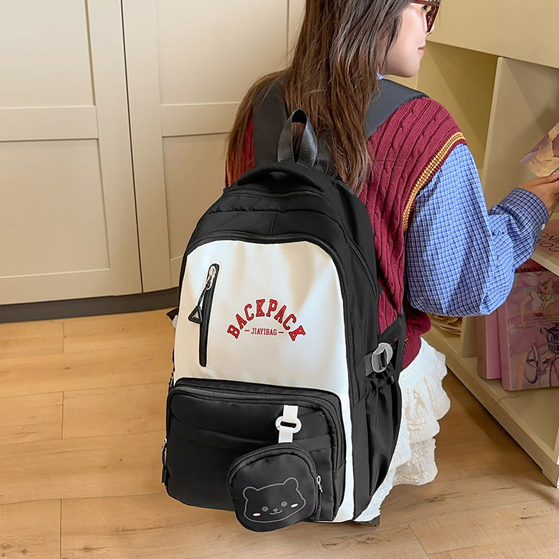 Small fresh student schoolbag, cute, fashionable and high-value backpack, large-capacity texture splicing contrasting color backpack.