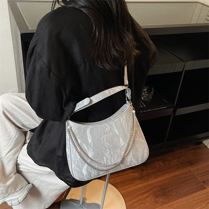 High-end women's bag, large capacity, 2025 new style, niche design, shoulder bag, crossbody bag, understated luxury, textured, commuter tote bag
