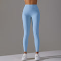 High-waisted, barely-there yoga pants for women, designed with a no-ride-up waistband for a seamless look. these figure-hugging, peach-shaped leggings offer a lift and a comfortable, stretchy fit, perfect for workouts and fitness activities. custom manufa