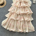 French riviera style sleeveless dress - women's  summer collection: slim fit, ruffle hem, tiered maxi dress