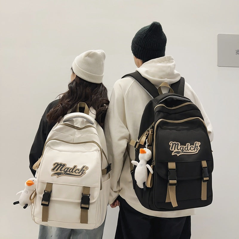 School bag for female college students, Korean version for junior high school students, high school, large-capacity burden reduction backpack for men's middle school students, casual backpack.
