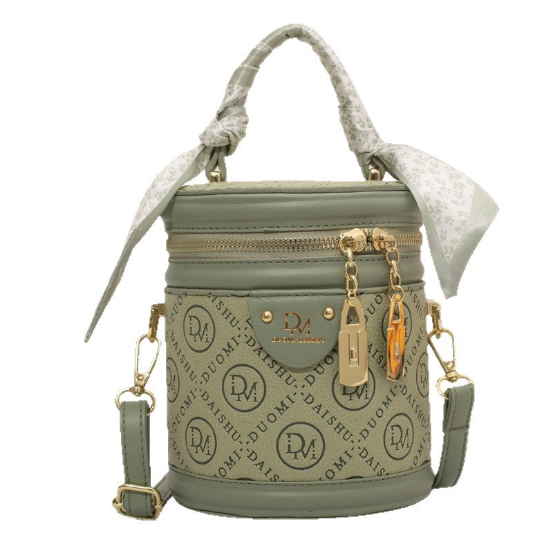 Solid color texture small bag women's autumn 2025 new trendy fashion niche portable round bucket bag popular messenger bag