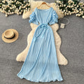 French-inspired pleated, waist-cinching, slimming dress for women. red, tie-waist, elegant, and flowy maxi dress, perfect for the office