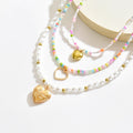 European and american cross-border bohemian heart pendant necklace, fashionable multi-layered colorful beaded faux pearl choker