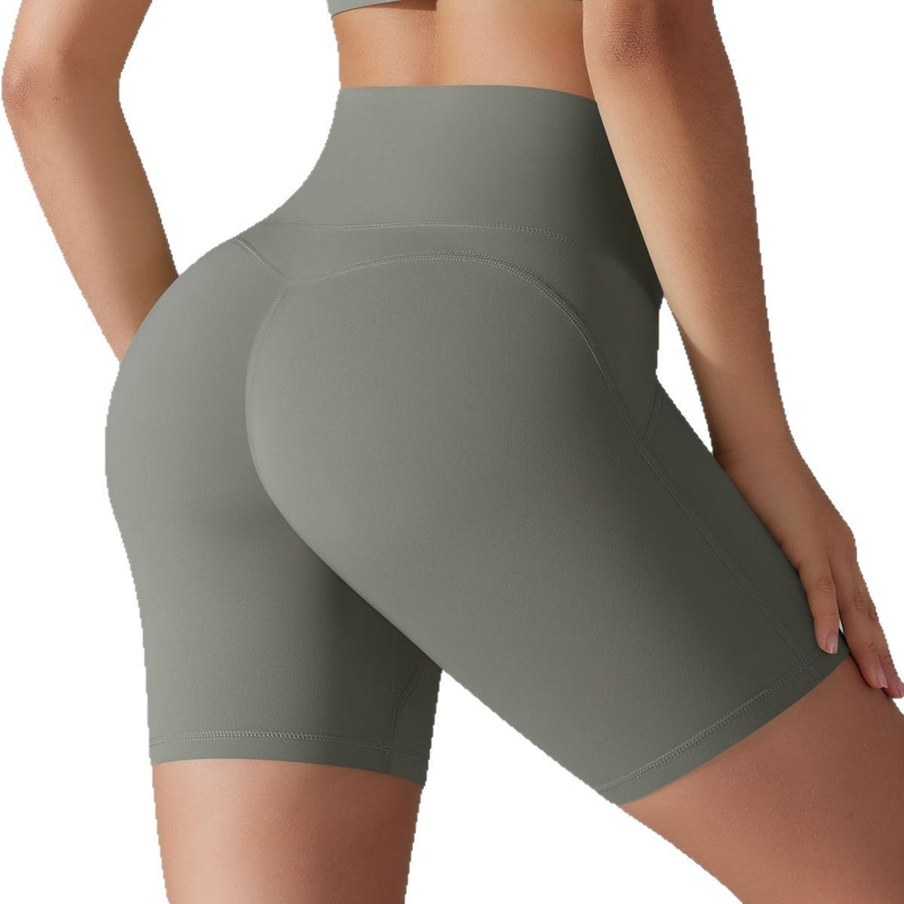 Naked-feel, high-waisted, butt-lifting yoga shorts – perfect for running, fitness, and a custom-made, three-quarter length fit. sampling and oem manufacturing available