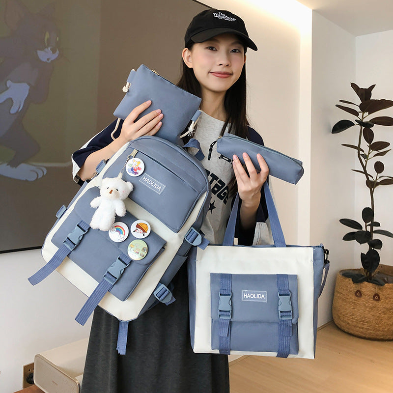 New fashionable contrasting color student schoolbag junior high school large-capacity four-piece backpack class travel backpack make-up bag