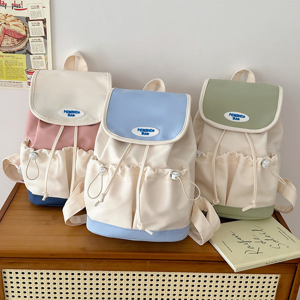 Summer new splicing contrasting color backpack 2025 bag cover design Mori niche leisure backpack going out travel bag