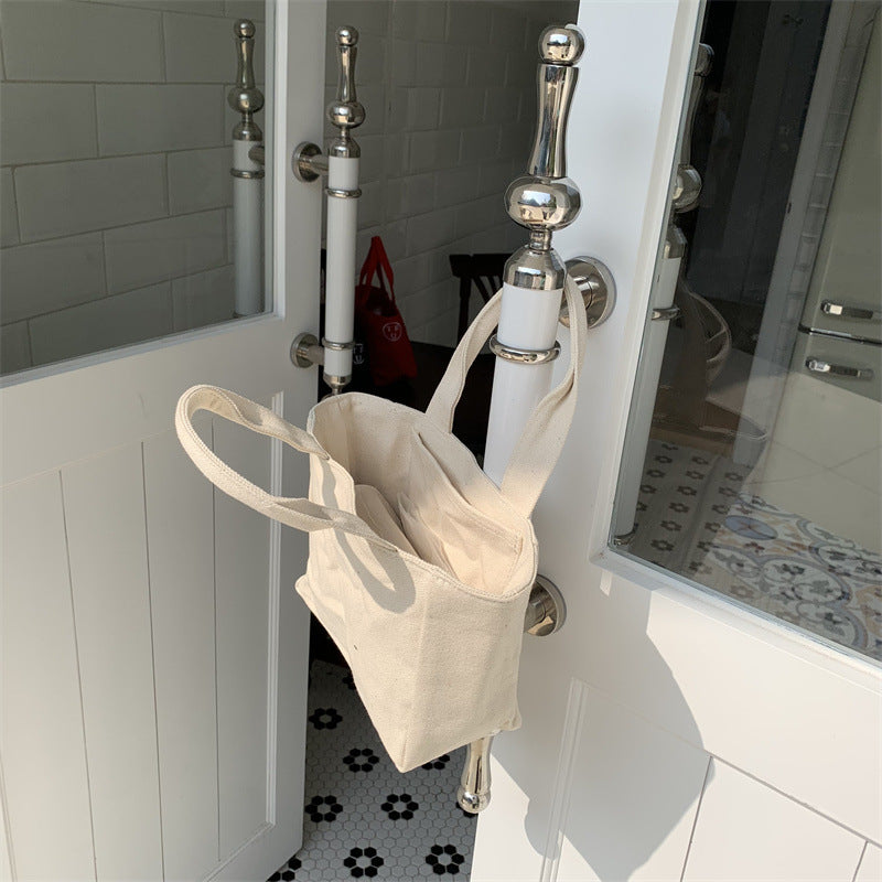 New bag female Korean generation with the same letter printed canvas handbag bento bag simple casual light tote bag