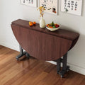 Foldable dining table - round, portable, and space-saving. perfect for home use. new foldable dining table for living rooms and dining areas