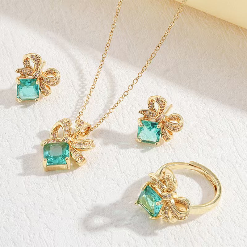 Titanium steel necklace women's bow pendant earrings ring light luxury high-end inlaid clavicle chain earrings jewelry wholesale
