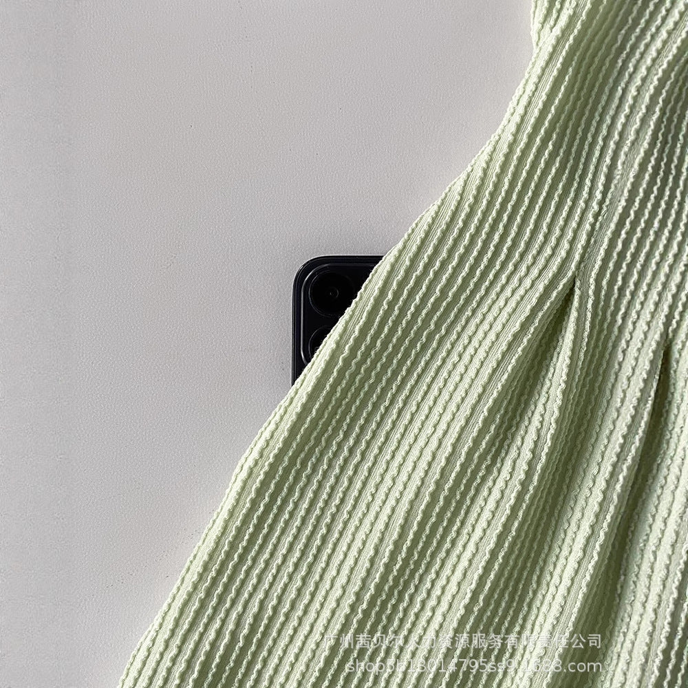 ODL2369 's new European and American pleated two-color crimped ribbed button jumpsuit