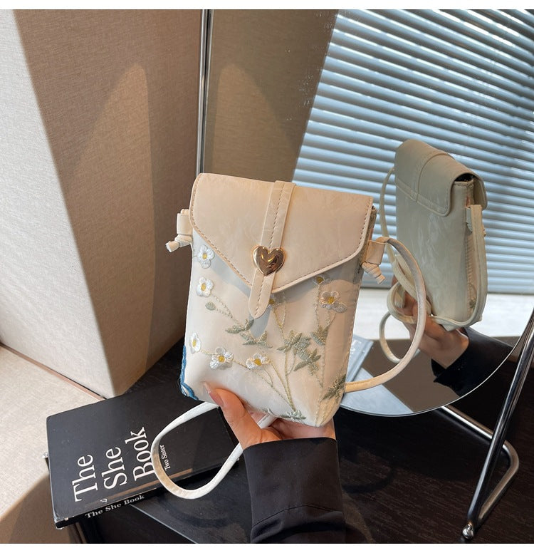 Cross-border embroidered canvas bag women's summer 2025 new fashion niche messenger bag Korean version Internet celebrity popular mobile phone bag