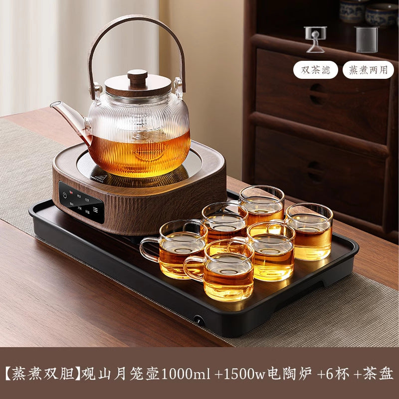 A complete set of wood grain electric ceramic stoves for making tea around the stove, a set of glass teapots for making tea around the stove, and an electric stove