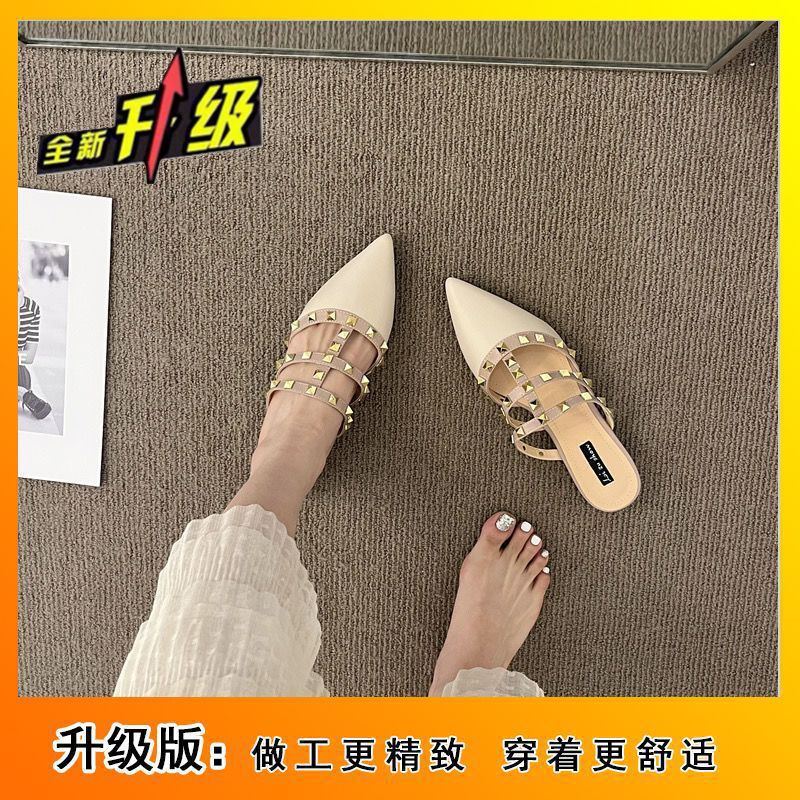 Frenchclassy sense of rivets toe-cap half slippers for women spring and summerflatsoutwear2025k-style patent leather pointed toe sandals