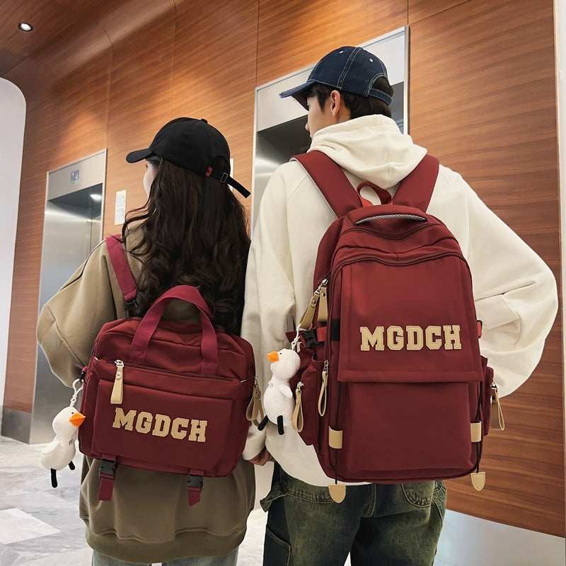 School bag women's new large-capacity backpack crossbody bag men's junior high school high school burden reduction primary school students diagonal span bag