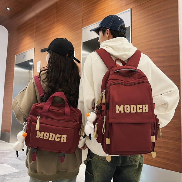 School bag women's new large-capacity backpack crossbody bag men's junior high school high school burden reduction primary school students diagonal span bag