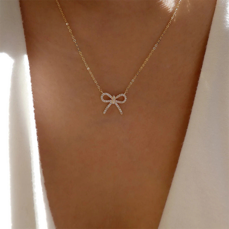 Wholesale bowknot necklaces - european & american cross-border jewelry - minimalist fashion pendants - women's alloy diamond-studded chokers & sweater chains
