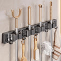 Bathroom bathroom punch-free strong mop wall hanging clip handy gadget fixed hook buckle broom storage storage rack