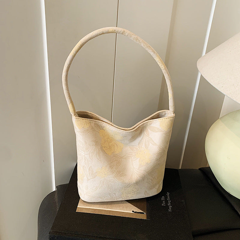 Fashion trend niche design bucket bag 2025 summer new foreign style casual texture women's shoulder messenger bag