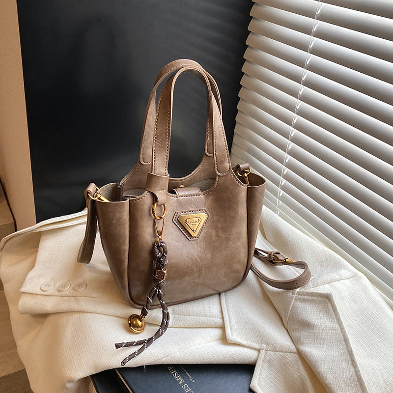 European and American retro trend shoulder bag 2025 new women's bag messenger bag foreign style solid color bucket bag underarm bag portable