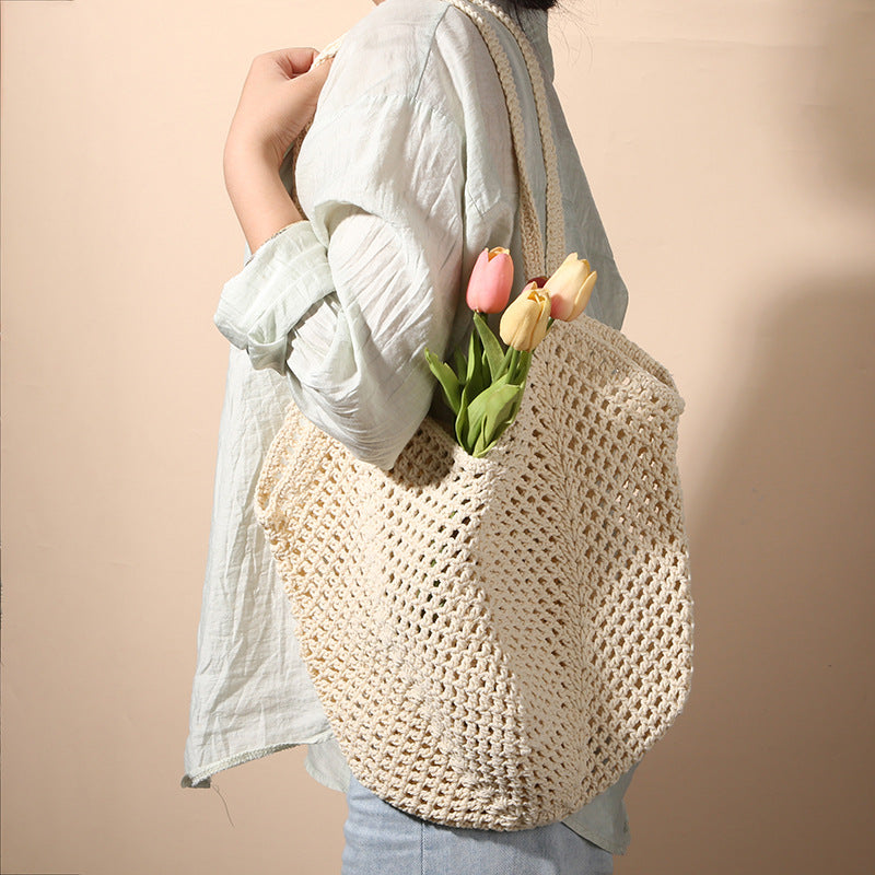 Casual large-capacity cotton thread woven bag new hollow straw bag lazy wind shoulder bag vacation beach bag women's bag